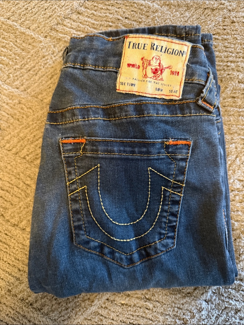 True Religion Blue Denim Jeans with Yellow Stitching and Orange Accents